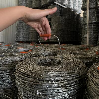 Thép không gỉ gai mạ kẽm giá tốt dây thép gai dao cạo dài 500 mét hàng rào dây thép gai
